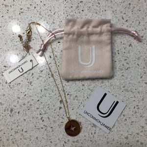 Uncommon James gold necklace.